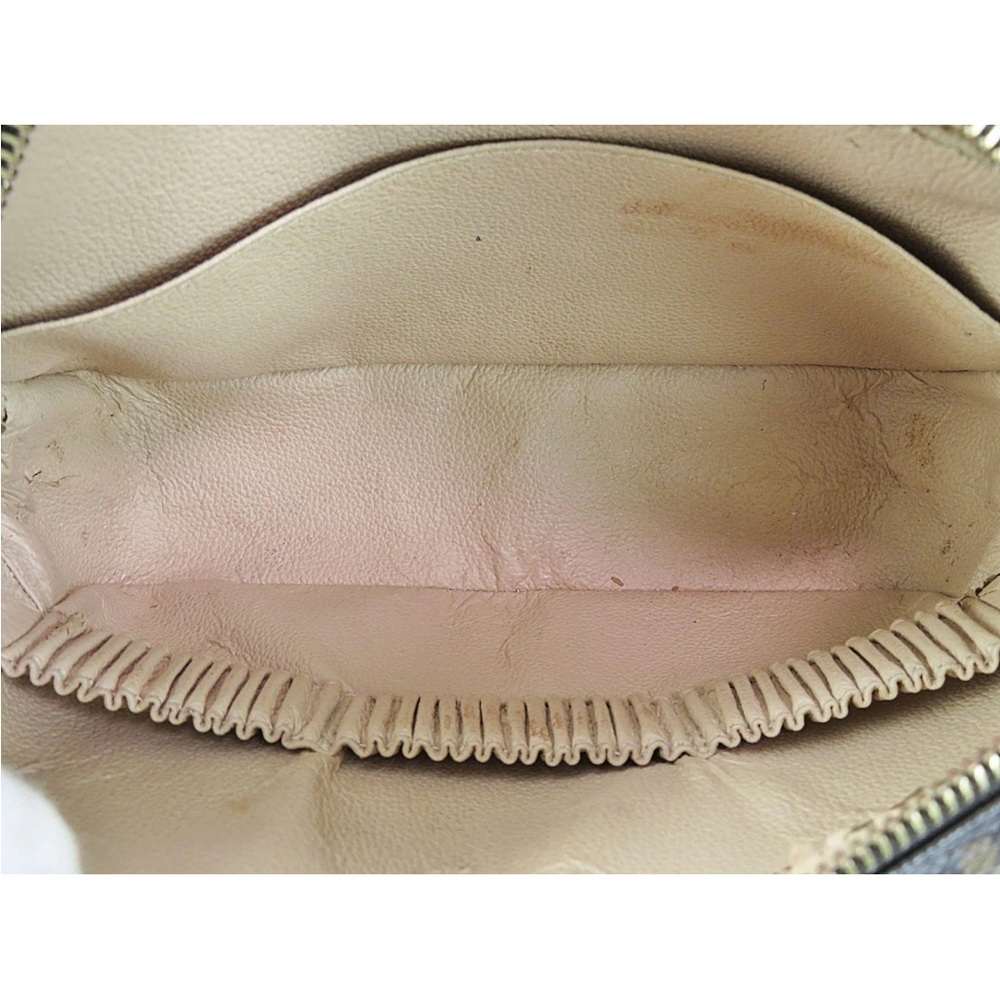 Louis Vuitton Monogram Toiletry Bag in Brown and Gold - Picture 9 of 16